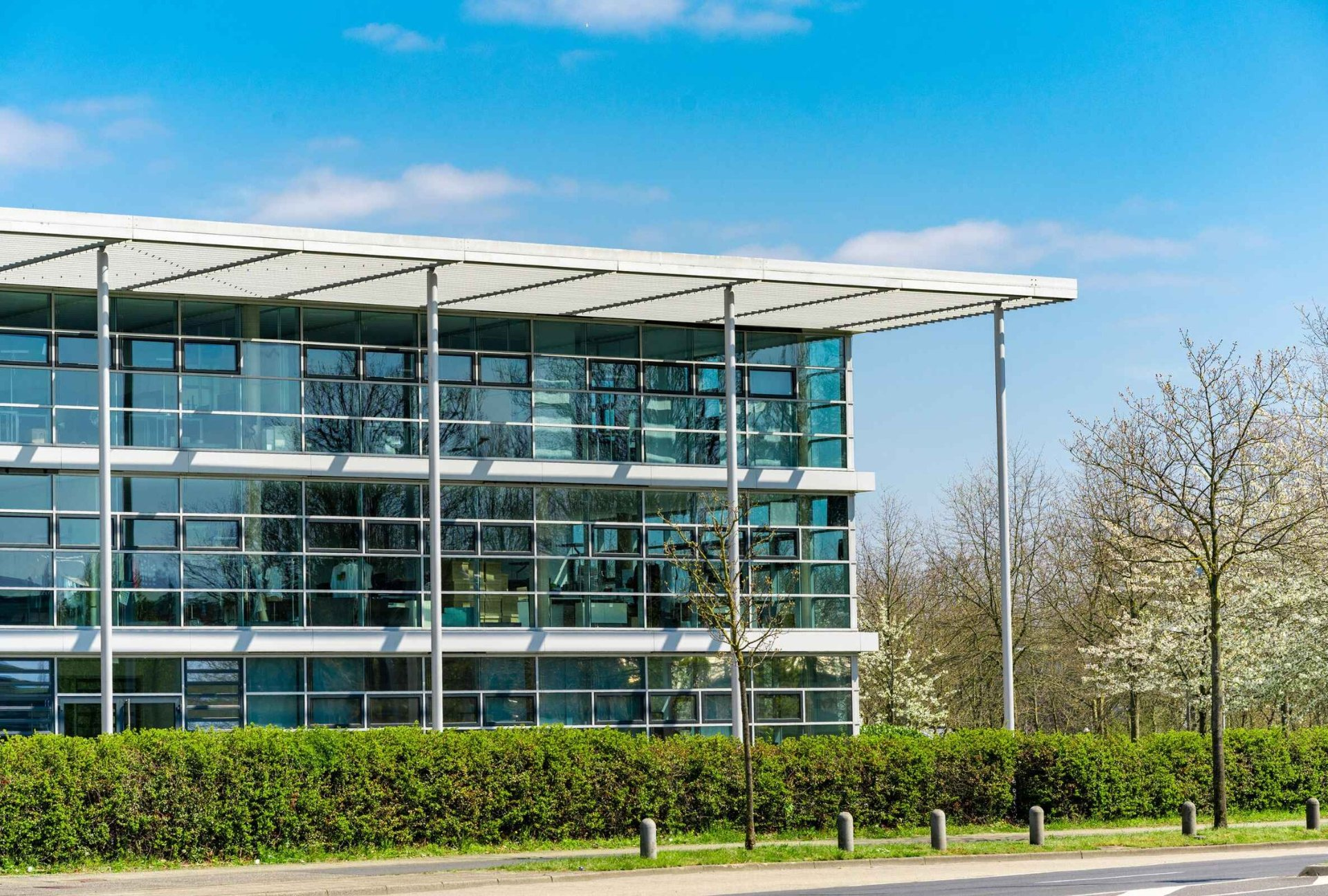 glass-office-building-green-city-2025-01-07-06-58-26-utc_edited-1