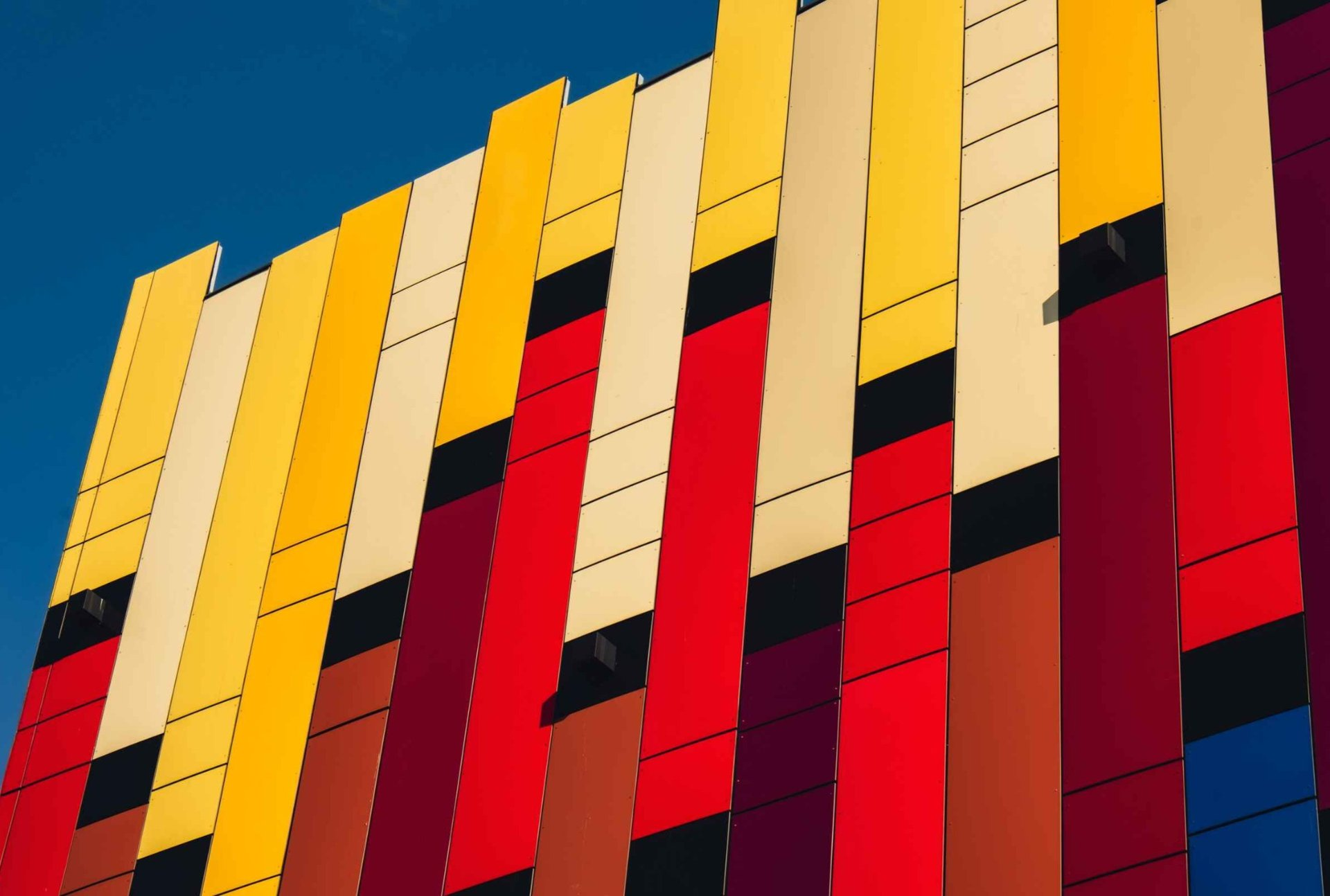 modern-colorful-office-building-exterior-with-glas-2025-03-11-13-05-47-utc_edited-1